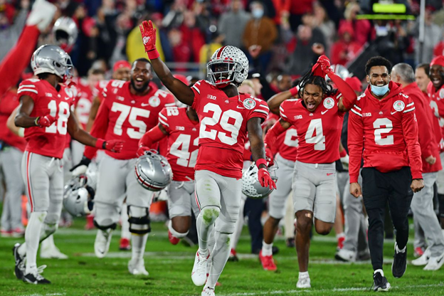 Beyond Football: Exploring the Ohio State University's Staggering Budget 2 footballers celebrate
