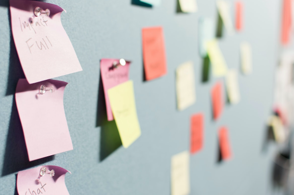 How to Develop an Effective Brand Strategy: Key Steps and Insights 2 post-its on the board
