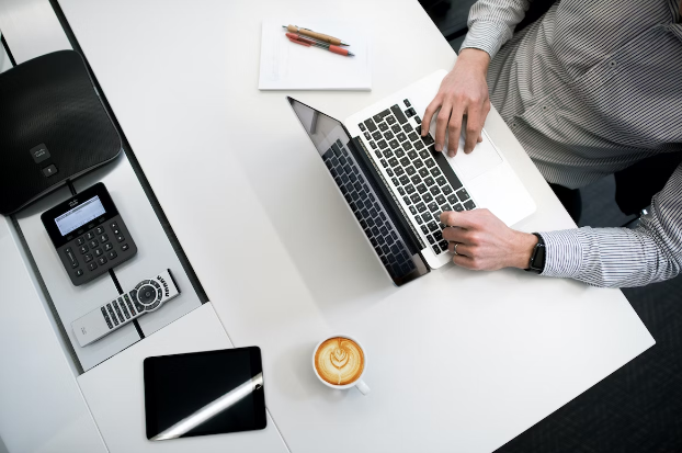 Advice on Building Your Business Despite Credit Challenges: A Step-by-Step Guide 2 Man using laptop