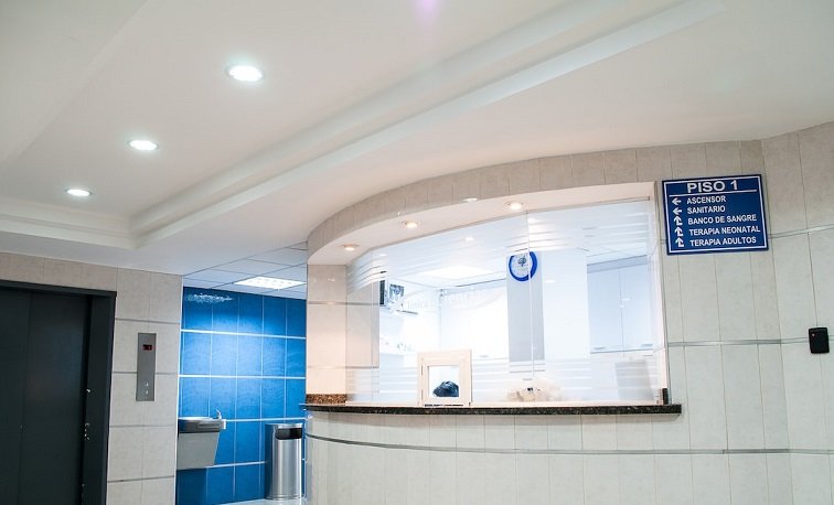 How To Implement a Secure HIPAA Fax API 1 A doctor's office where the front desk is empty